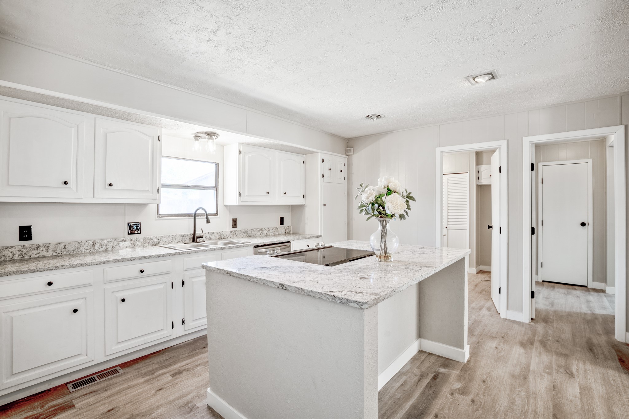 Fresh Kitchen with Granite tops and Island
