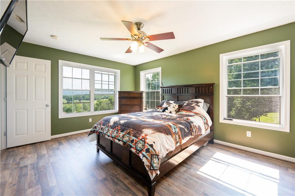 387 George Lane Seward, PA 15954 - Photo 18 of 45 a bed sitting in a spacious bedroom next to a window