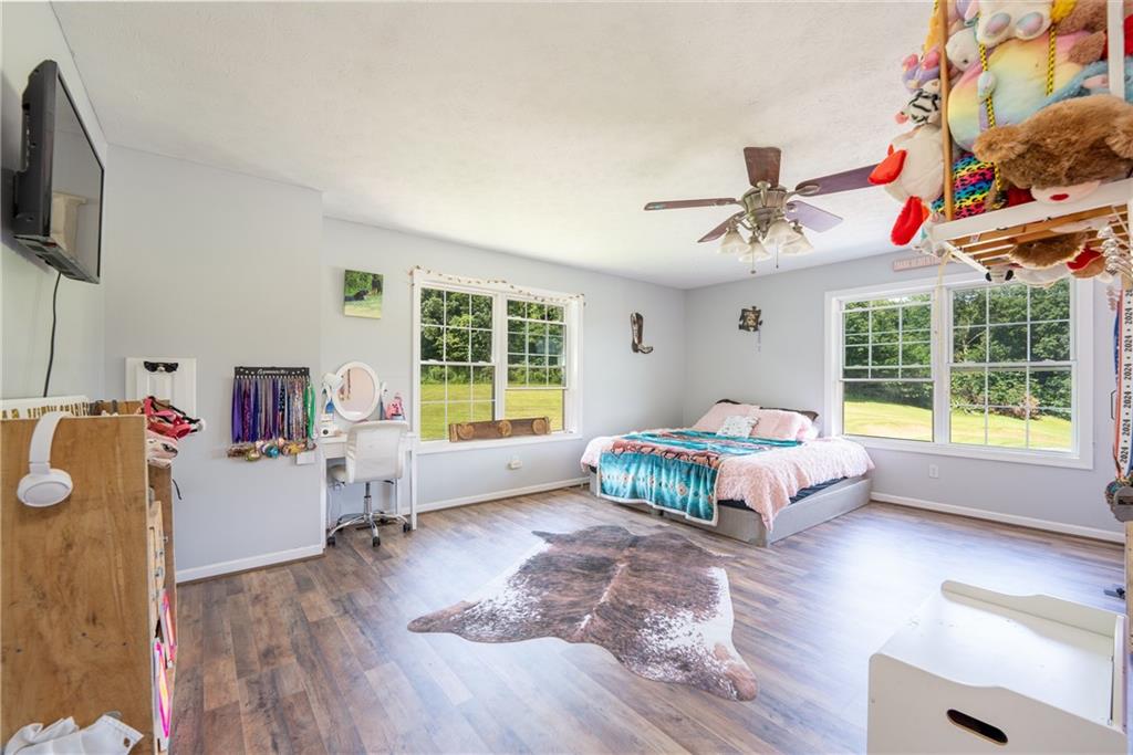 387 George Lane Seward, PA 15954 - Photo 20 of 45 a bedroom with furniture and a flat screen tv