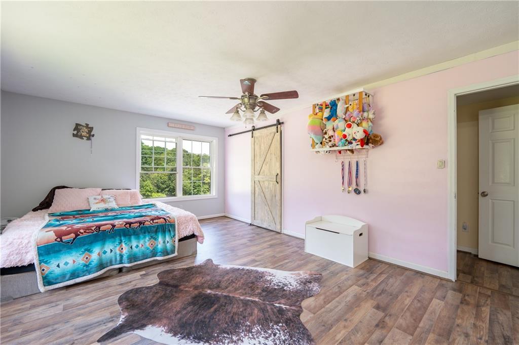 387 George Lane Seward, PA 15954 - Photo 21 of 45 a bedroom with a bed and a window