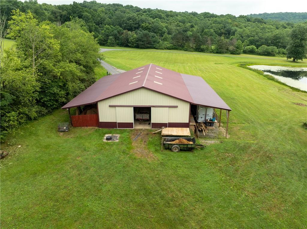 387 George Lane Seward, PA 15954 - Photo 35 of 45 a aerial view of a house with swimming pool and a yard