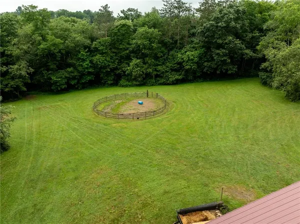 a view of a golf course with a swimming pool