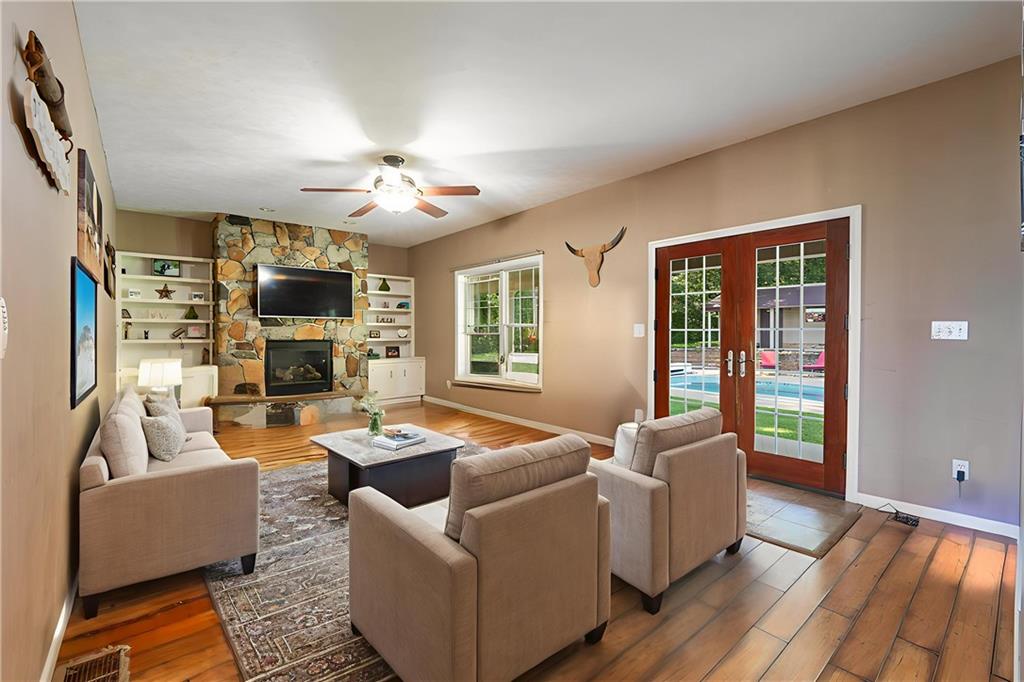 387 George Lane Seward, PA 15954 - Photo 10 of 45 a living room with furniture fireplace and a flat screen tv