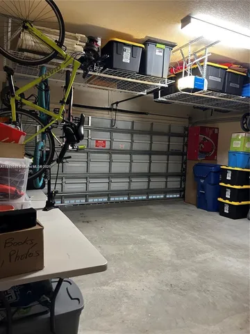 a view of a house with backyard porch and sitting area