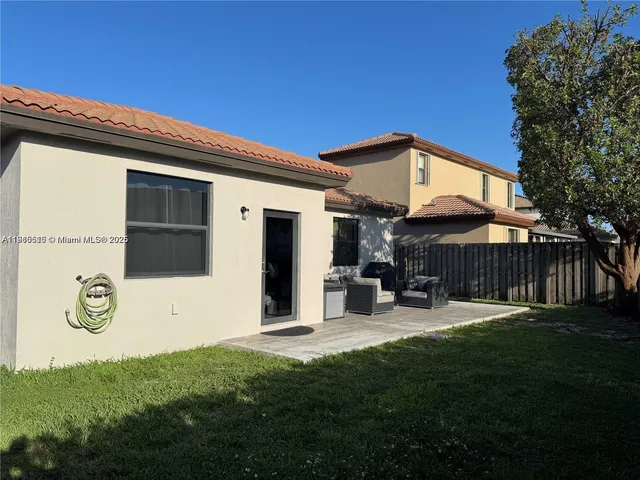 a view of a couches in a patio