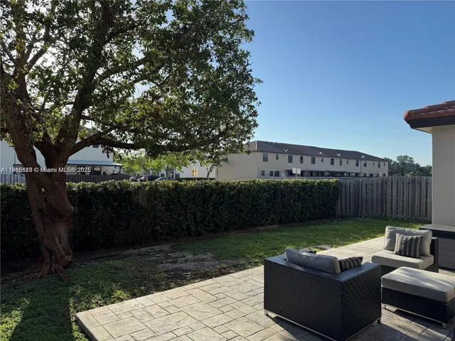 a view of a lush green field