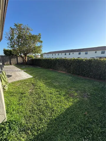 a swimming pool view with a lake view