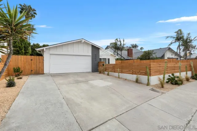 a view of a house with a garage