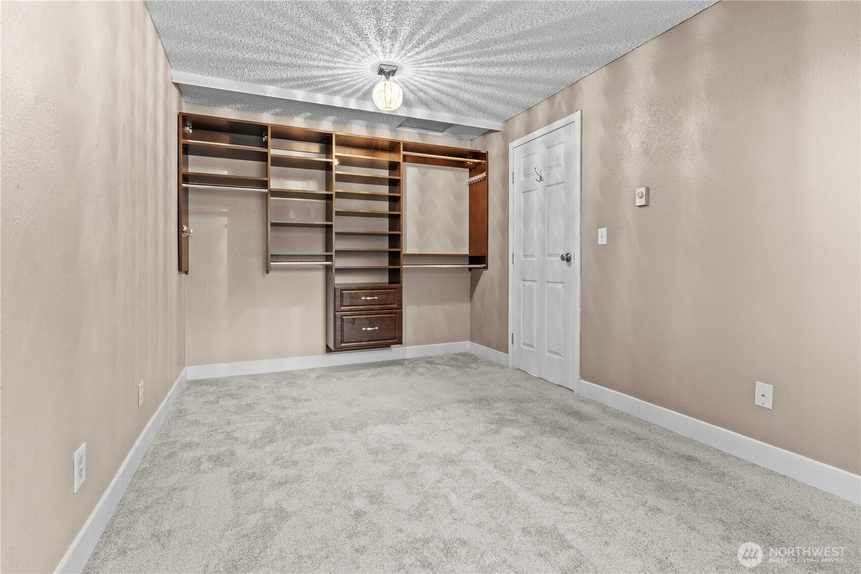 17303 Spanaway Loop Road South, Unit 4 Spanaway, WA 98387 - Photo 14 of 33 a view of empty room with a ceiling fan