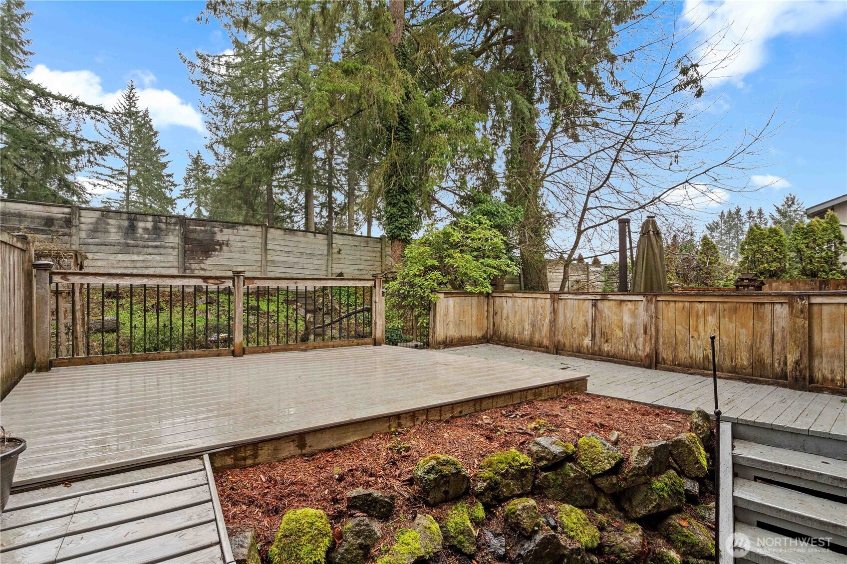 17303 Spanaway Loop Road South, Unit 4 Spanaway, WA 98387 - Photo 25 of 33 a view of a backyard