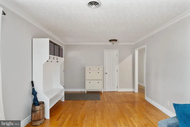 a kitchen with stainless steel appliances granite countertop a sink a refrigerator and a stove