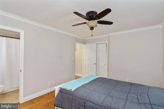 a view of a chair and table in the grass
