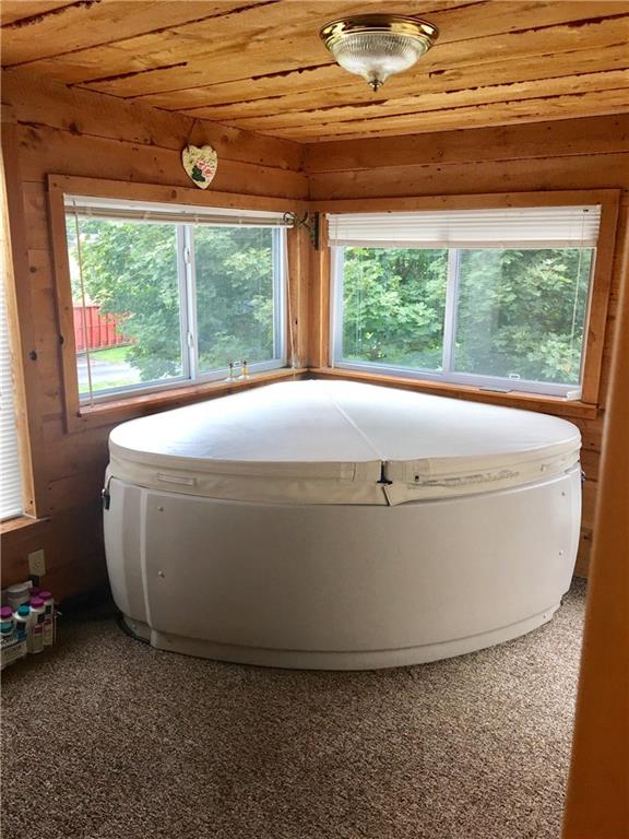 2746 Old Rte 18 Wampum, PA 16157 - Photo 13 of 25 Hot tub in the sunroom
