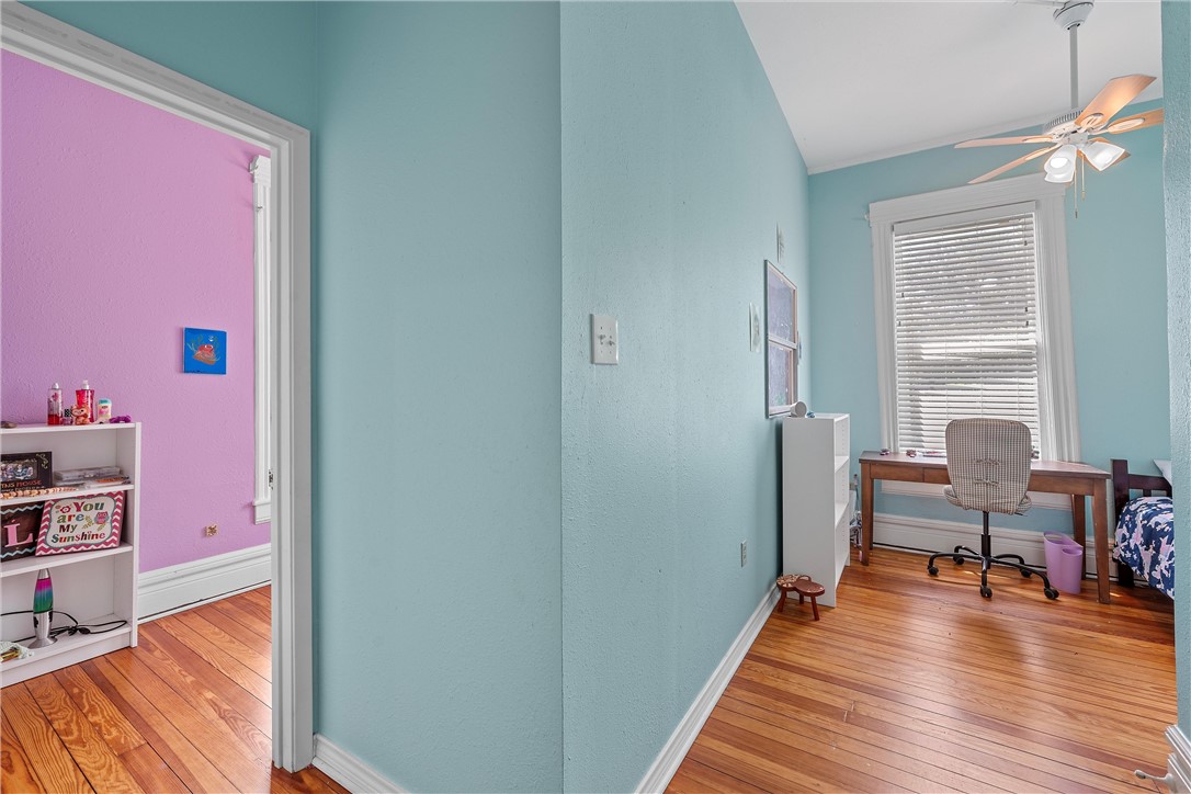 702 North 15th Street Waco, TX 76707 - Photo 22 of 45 a view of a room with wooden floor and furniture