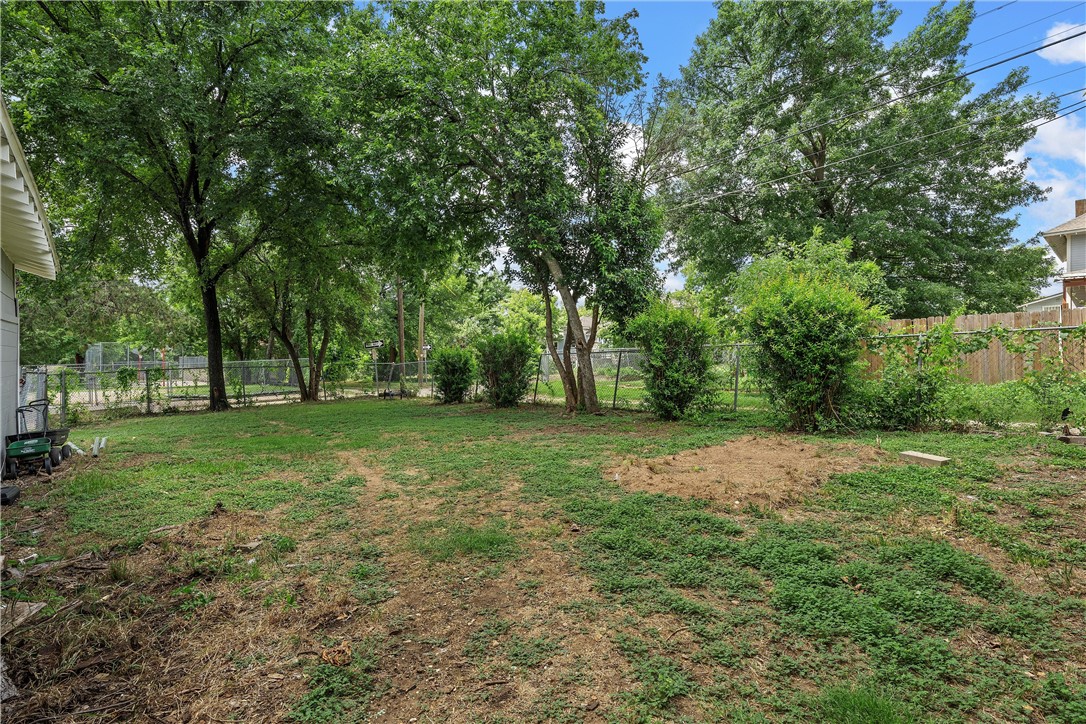 702 North 15th Street Waco, TX 76707 - Photo 37 of 45 a view of outdoor space with trees all around