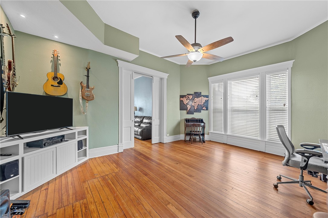 702 North 15th Street Waco, TX 76707 - Photo 9 of 45 a view of a livingroom with a flat screen tv