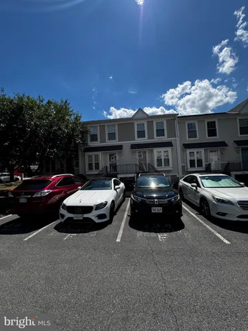 a car parked in front of a house