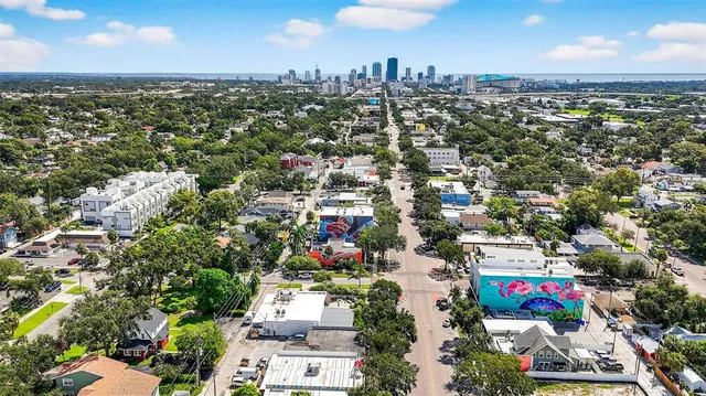 an aerial view of residential building and city view