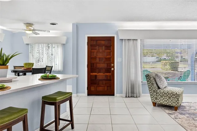 a living room with furniture and a table