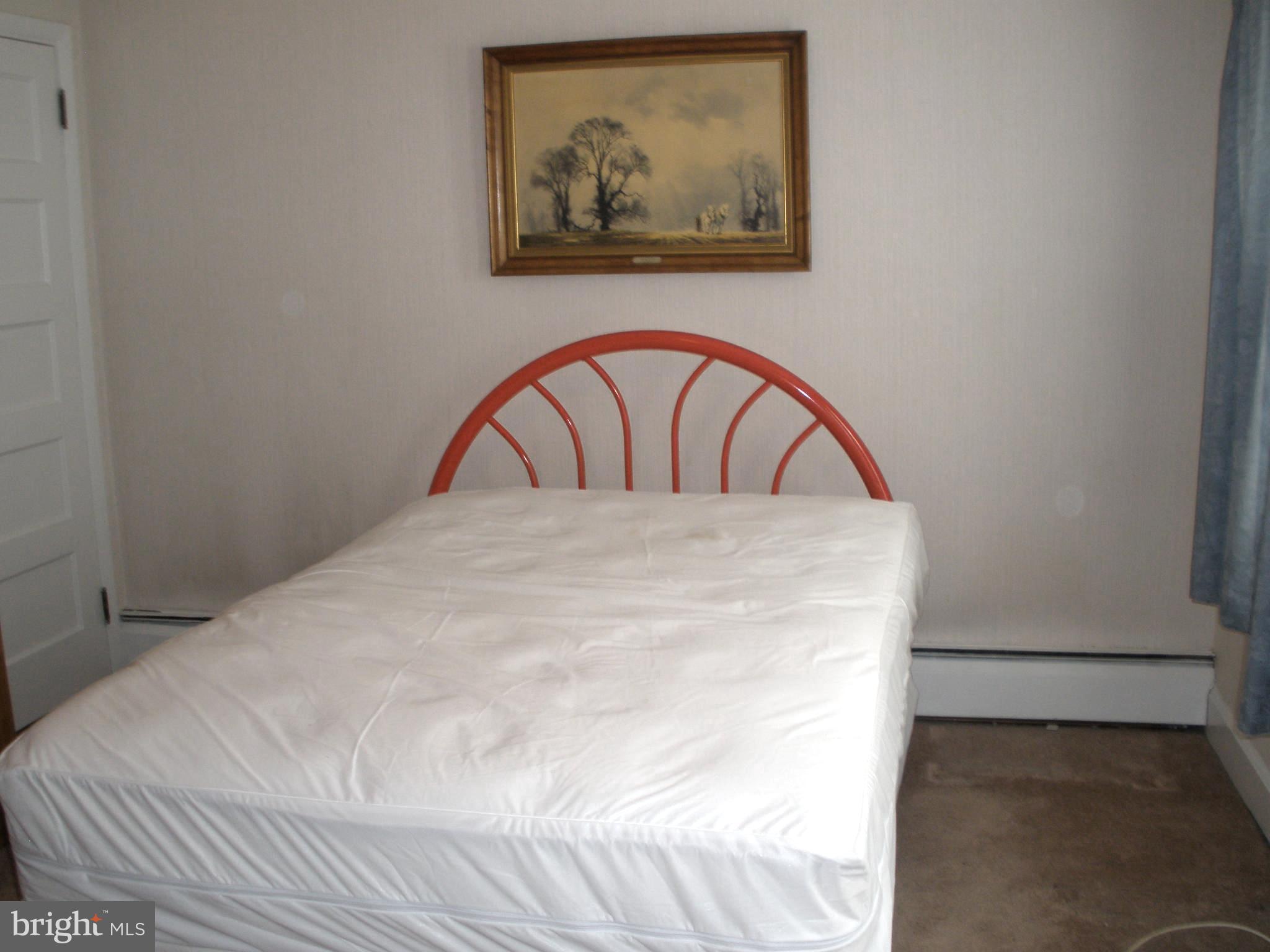 38 Kinship Road Baltimore, MD 21222 - Photo 21 of 38 a view of a bedroom with a bed