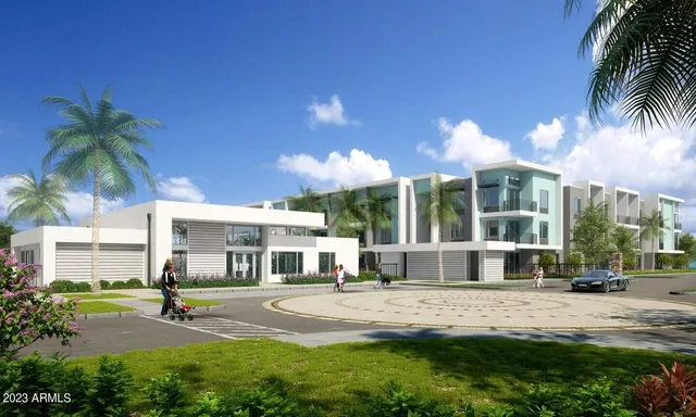 a view of a house with a yard and sitting area