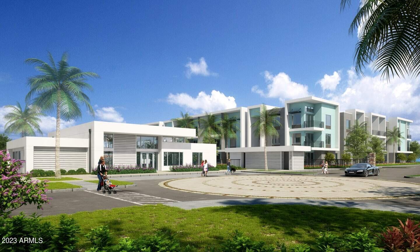 a view of a house with a yard and sitting area