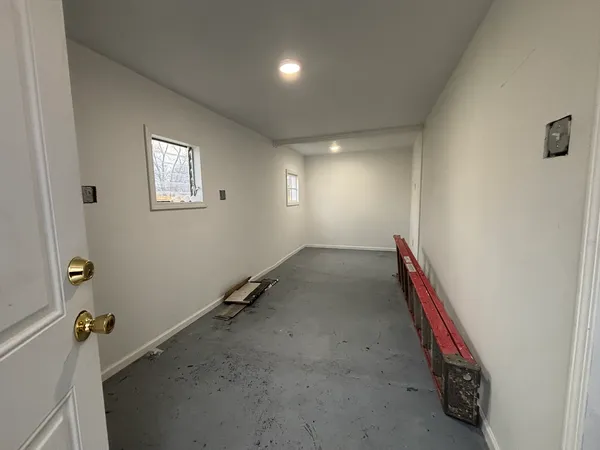 wooden floor and chair in a room
