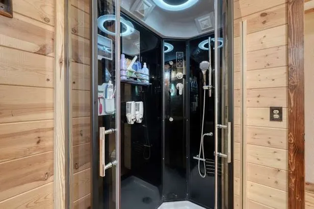 a view of a balcony with wooden floor