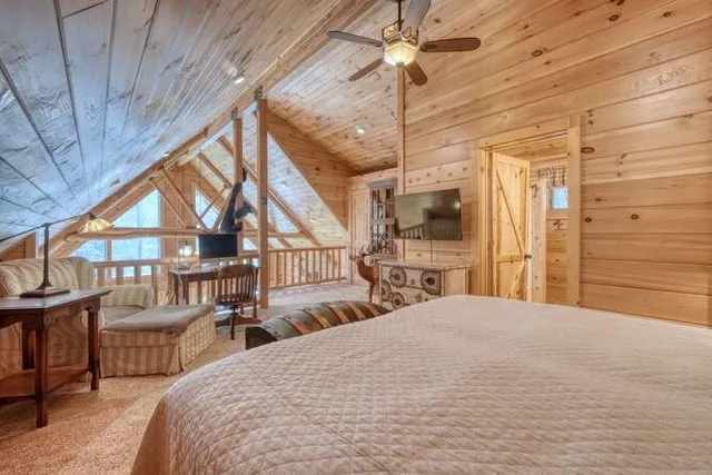a view of a patio with a dining table and chairs