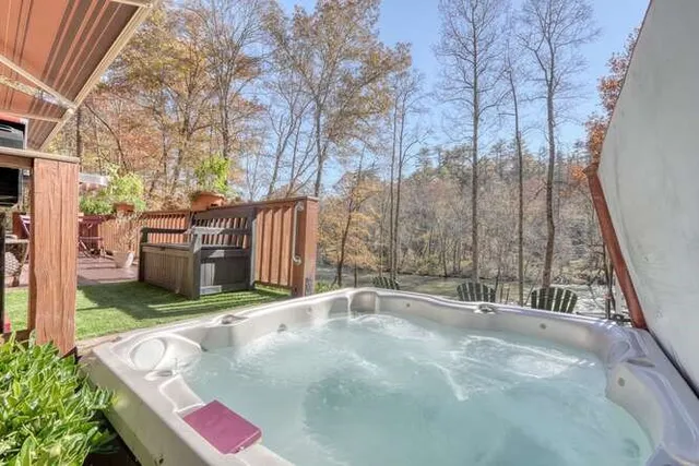 a view of house with backyard