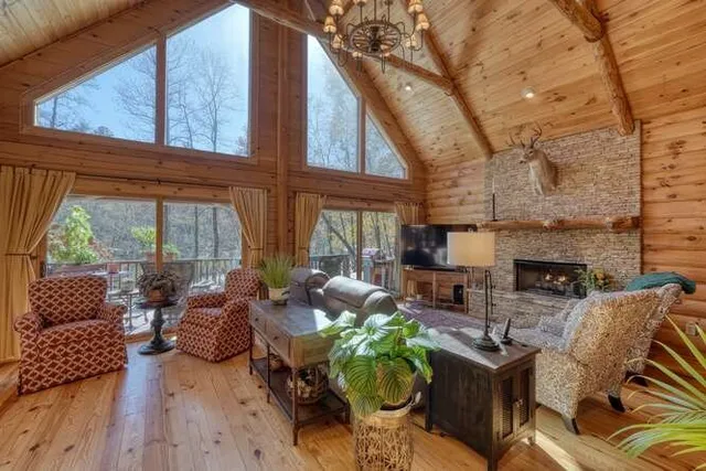 a living room with furniture and a rug