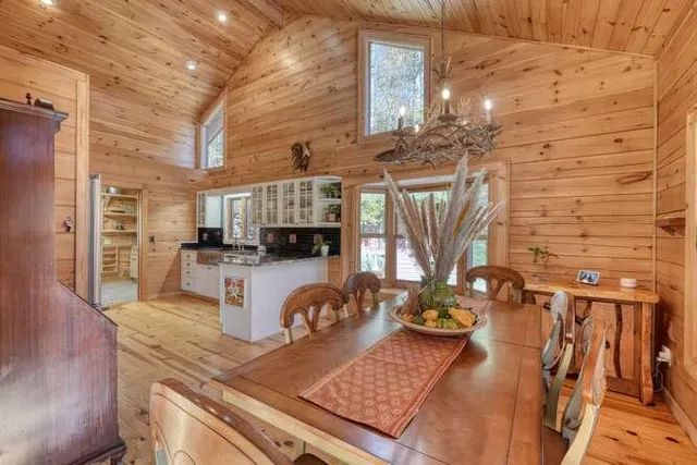 a kitchen with stainless steel appliances granite countertop a stove and cabinets