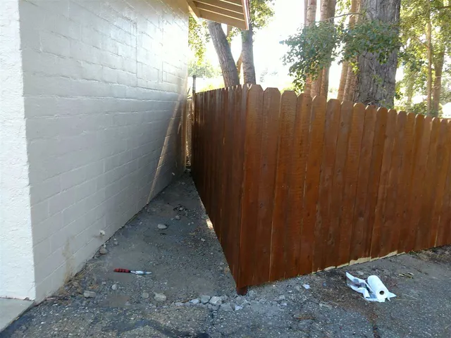 a view of a yard with trees