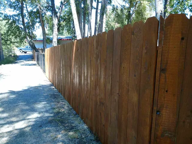 a view of a backyard of the house
