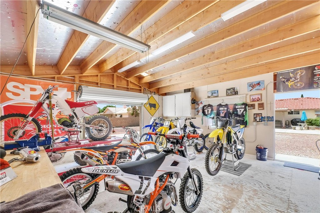 13931 Falling Leaf Road Apple Valley, CA 92307 - Photo 30 of 50 Workshop with Roll up door & electricity