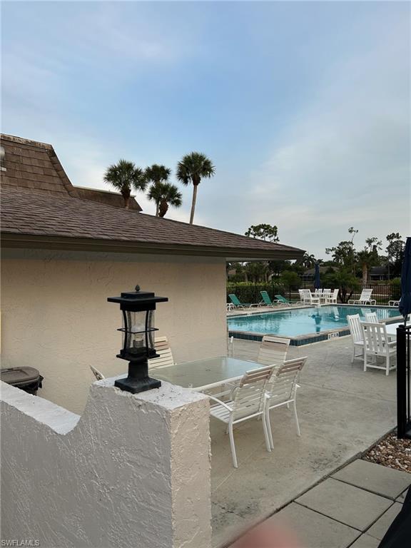 5651 Rattlesnake Hamm Road, Unit C107 Naples, FL 34113 - Photo 20 of 20 COMMUNITY POOL