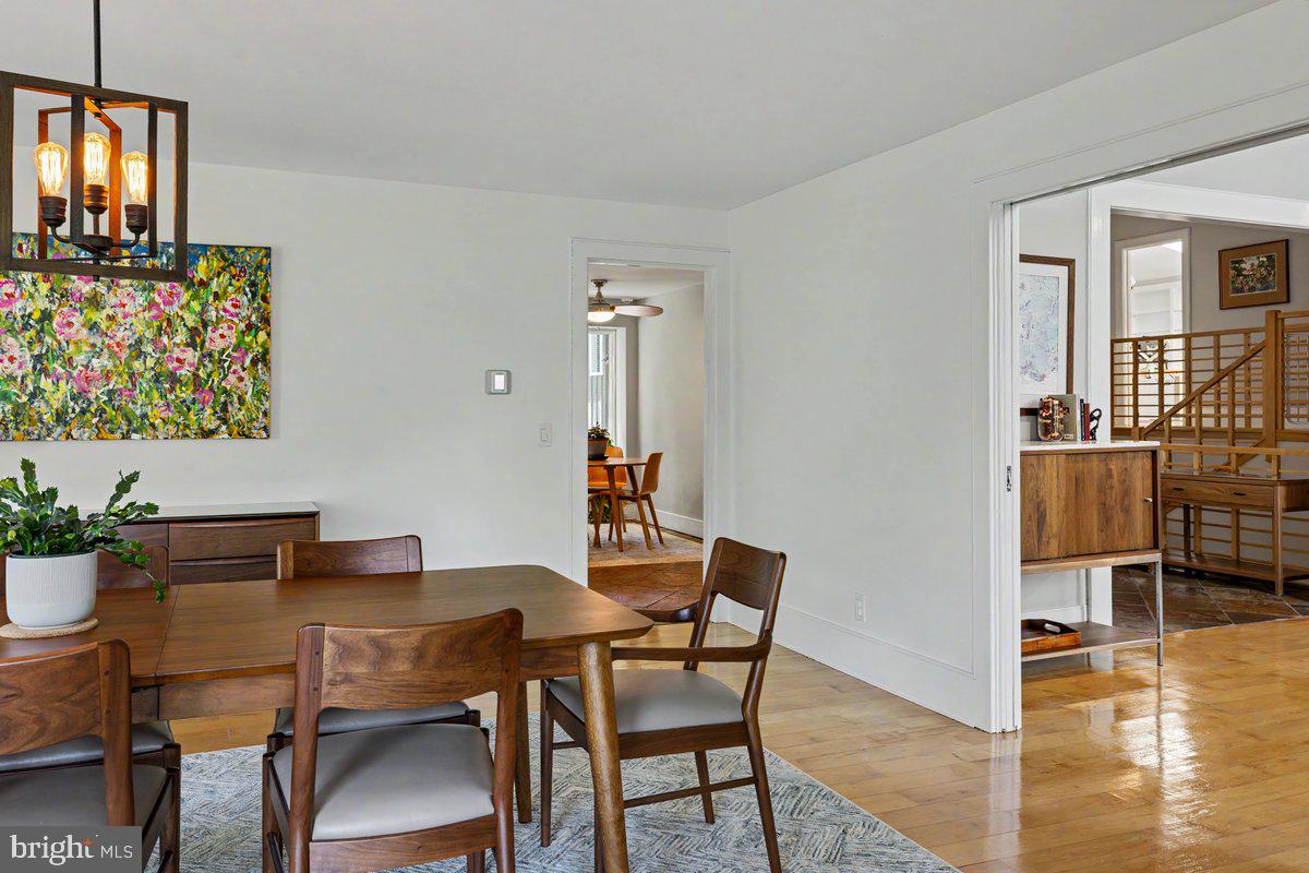 13 High Road New Hope, PA 18938 - Photo 17 of 56 a view of a dining room with furniture and wooden floor