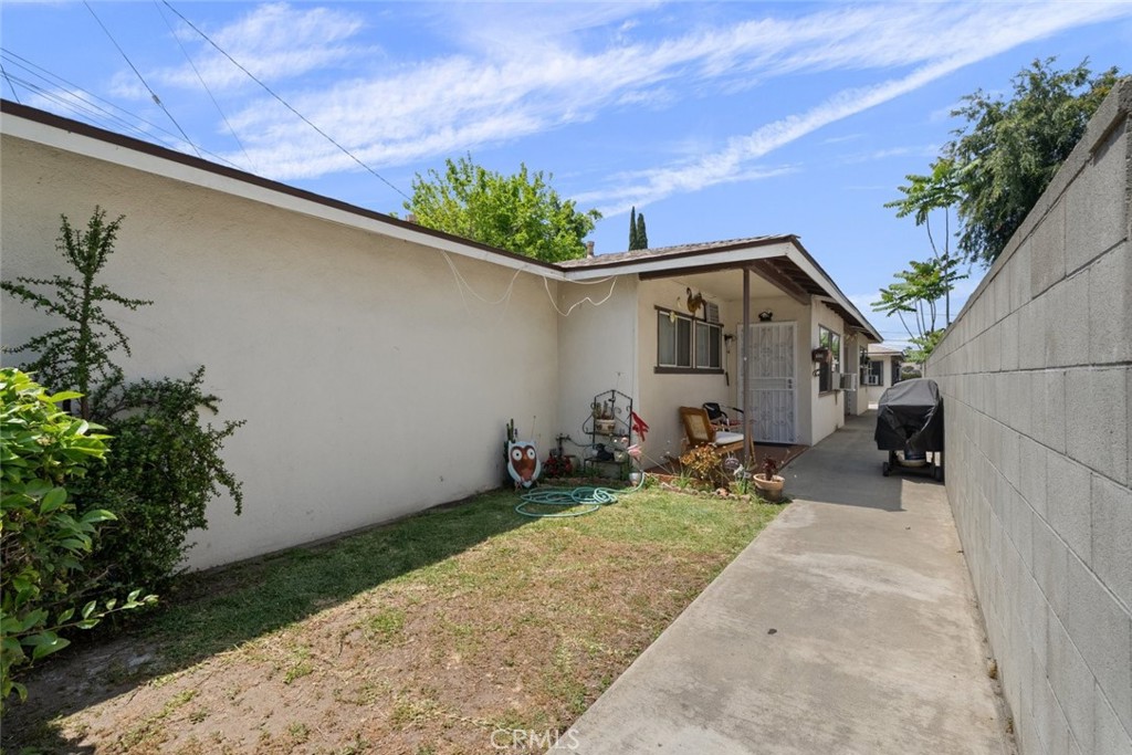 1618 Front Street Alhambra, CA 91803 - Photo 18 of 24 a front view of a house with a yard
