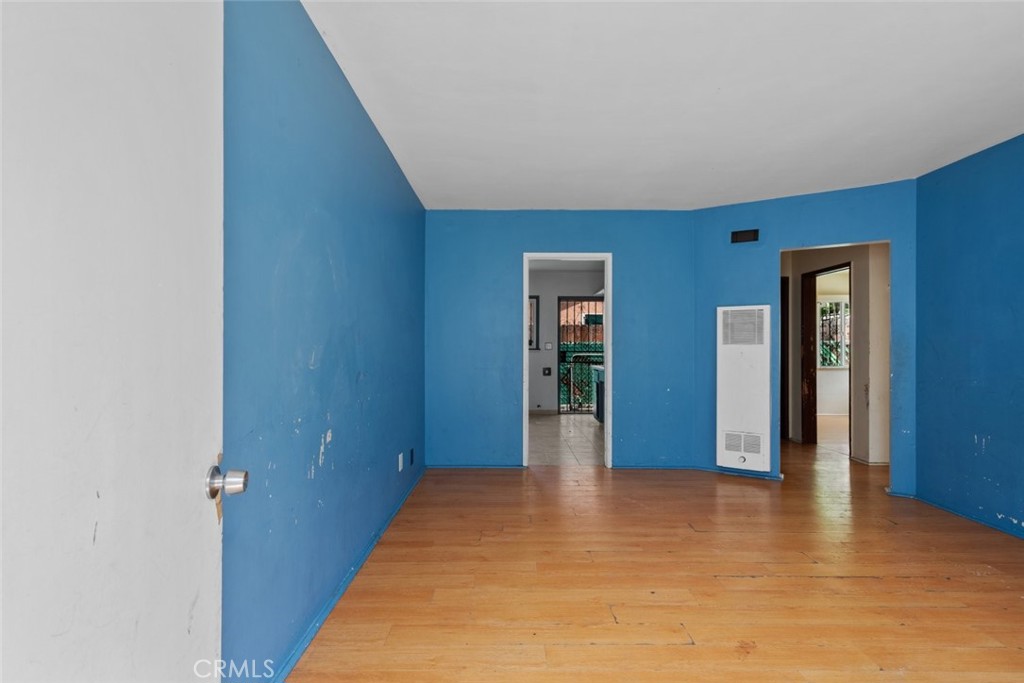 1618 Front Street Alhambra, CA 91803 - Photo 5 of 24 a view of a hallway with wooden shelves