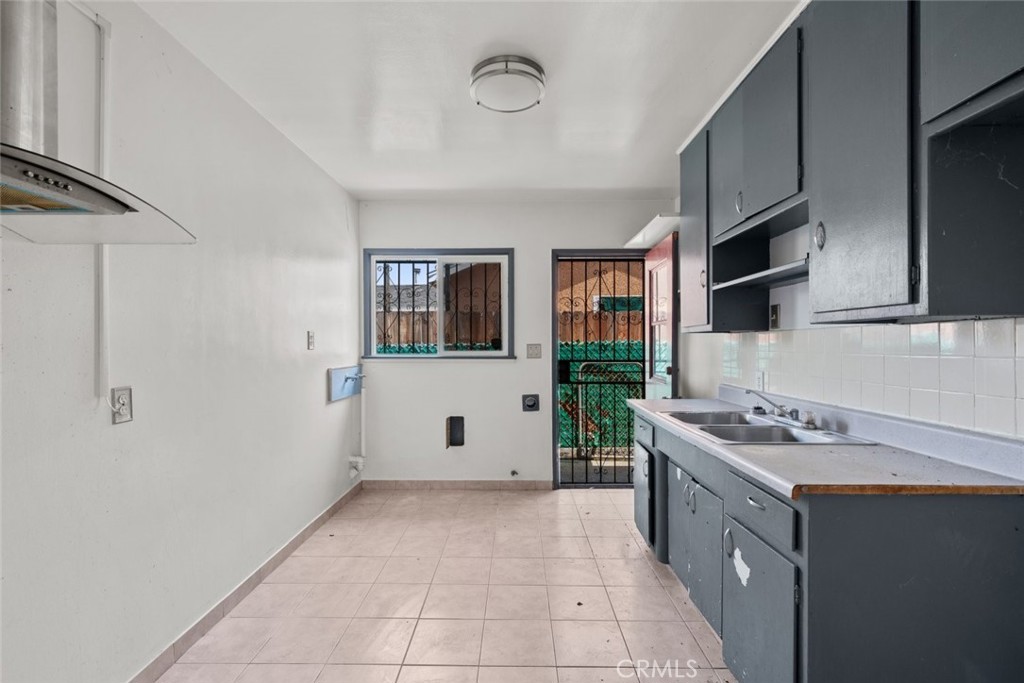 1618 Front Street Alhambra, CA 91803 - Photo 8 of 24 a kitchen with stainless steel appliances a sink dishwasher stove top oven and refrigerator