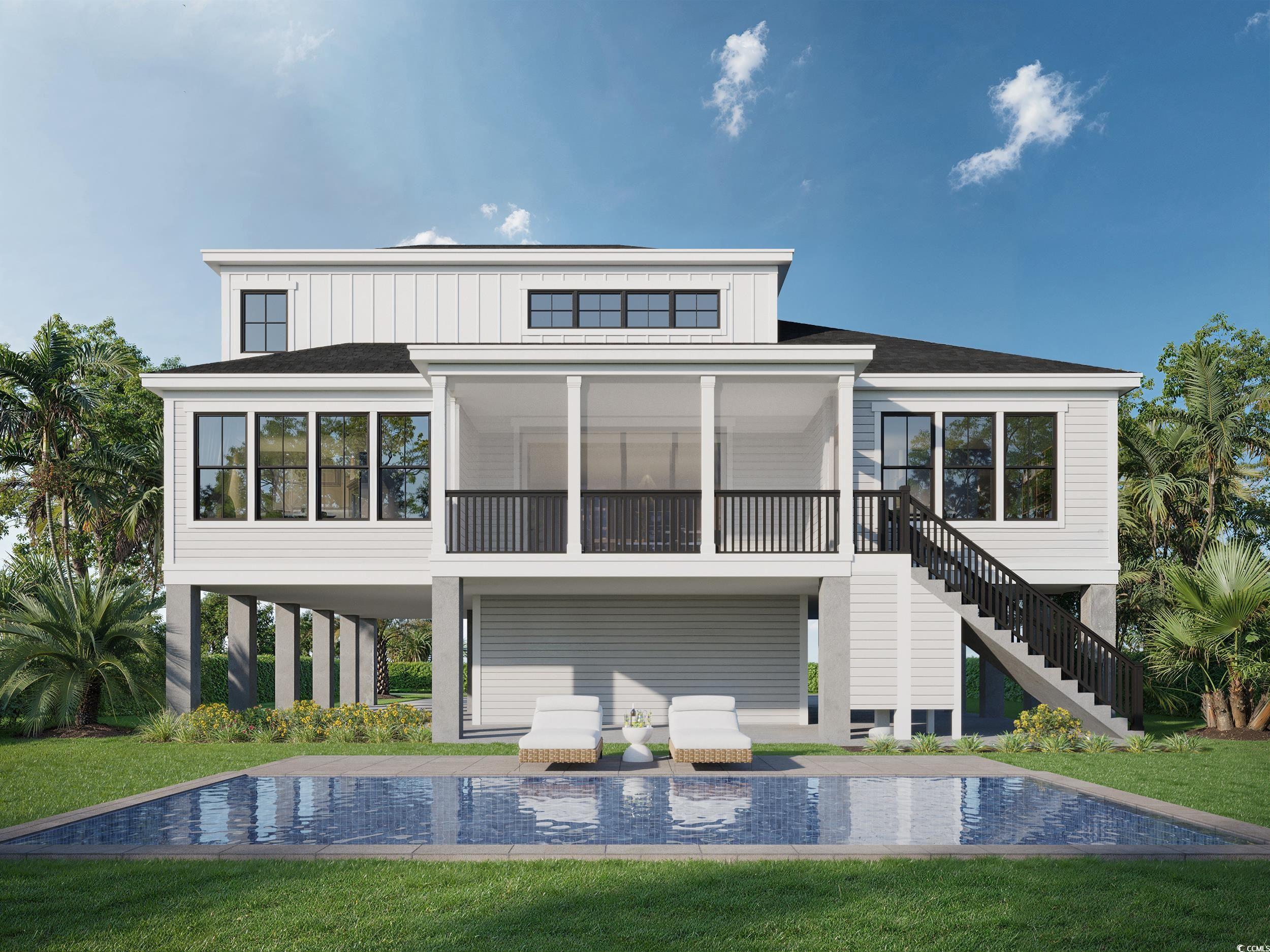 318 15th Avenue South Surfside Beach, SC 29575 - Photo 36 of 36 Rear view of property with a lawn, a sunroom, a swimming pool, and stairway