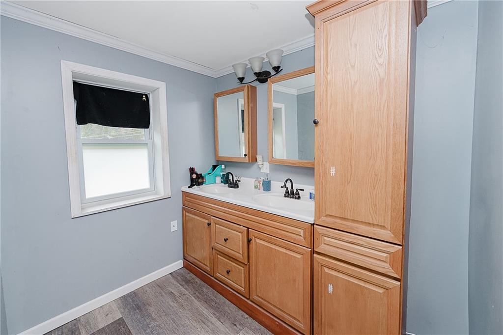 145 Baker Road Worthington, PA 16262 - Photo 18 of 50 a bathroom with a sink and mirror