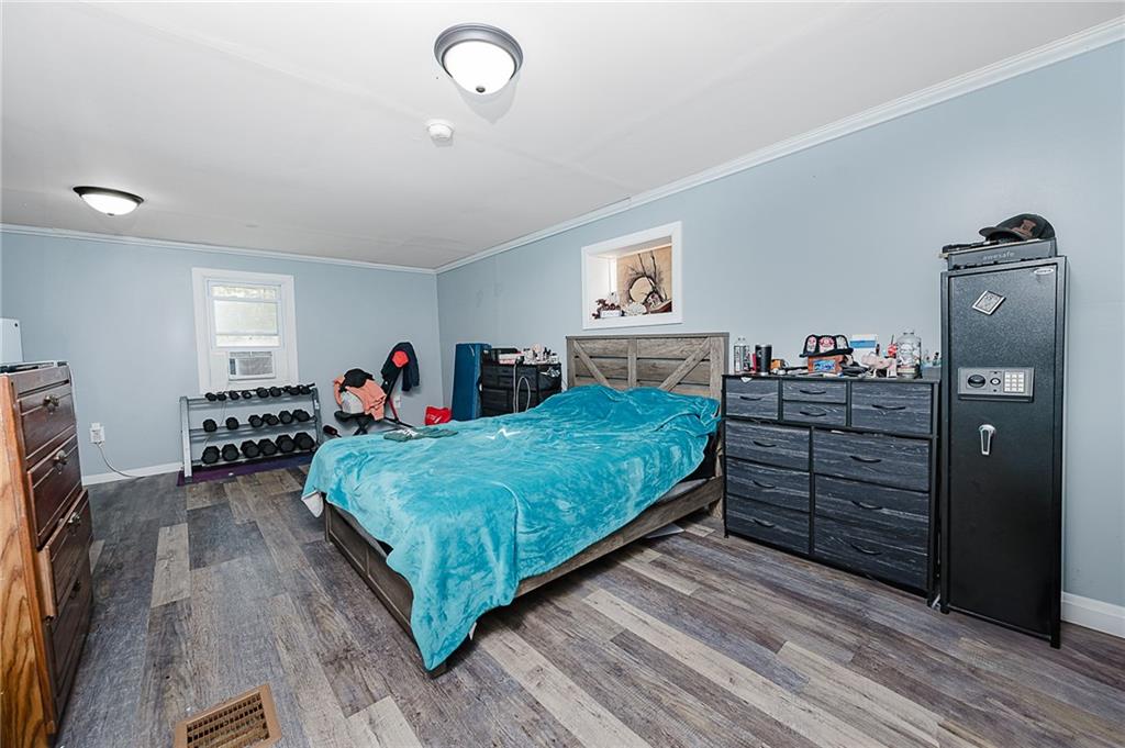 145 Baker Road Worthington, PA 16262 - Photo 19 of 50 a bed room with a bed and dresser