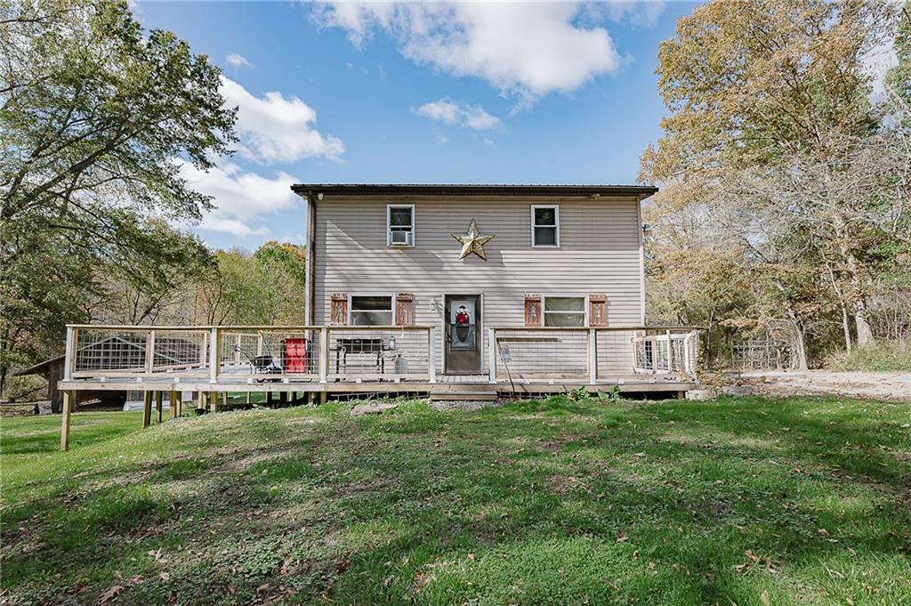 145 Baker Road Worthington, PA 16262 - Photo 2 of 50 a house view with a sitting space and garden