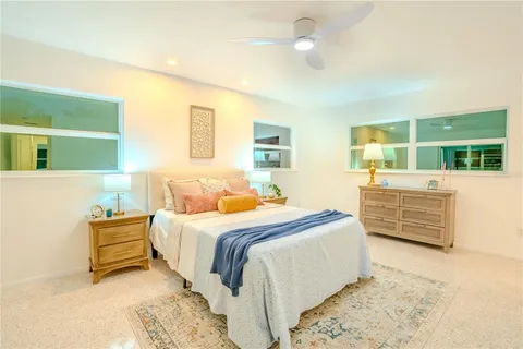 a bed room with a bed and a couch