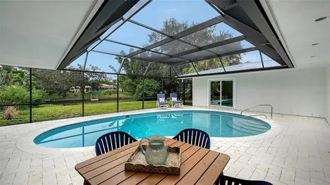 a view of swimming pool with patio
