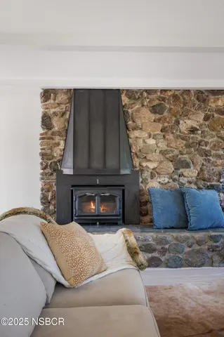 a kitchen with cabinets and appliances