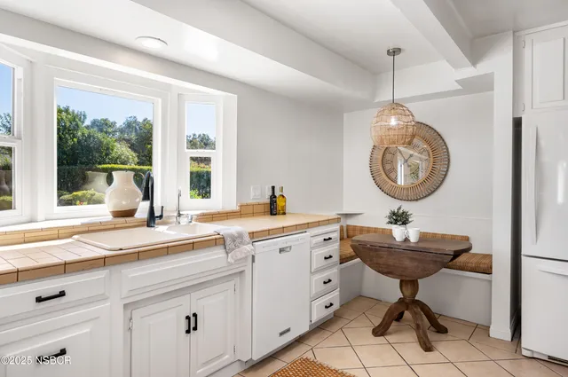 a bathroom with a sink toilet and vanity