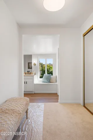 a view of a patio with a table and chairs
