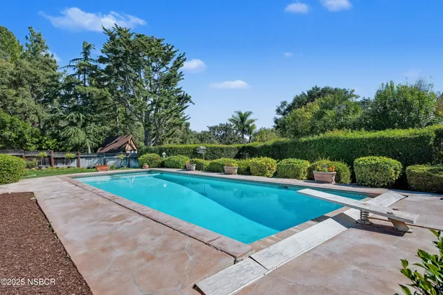 a view of a lake with a building in the background